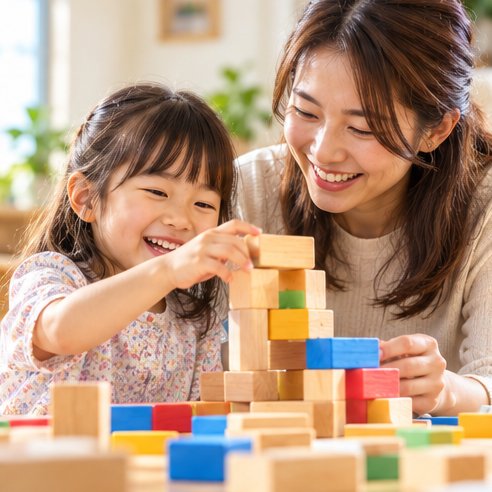 親子で積み木を積み上げる様子